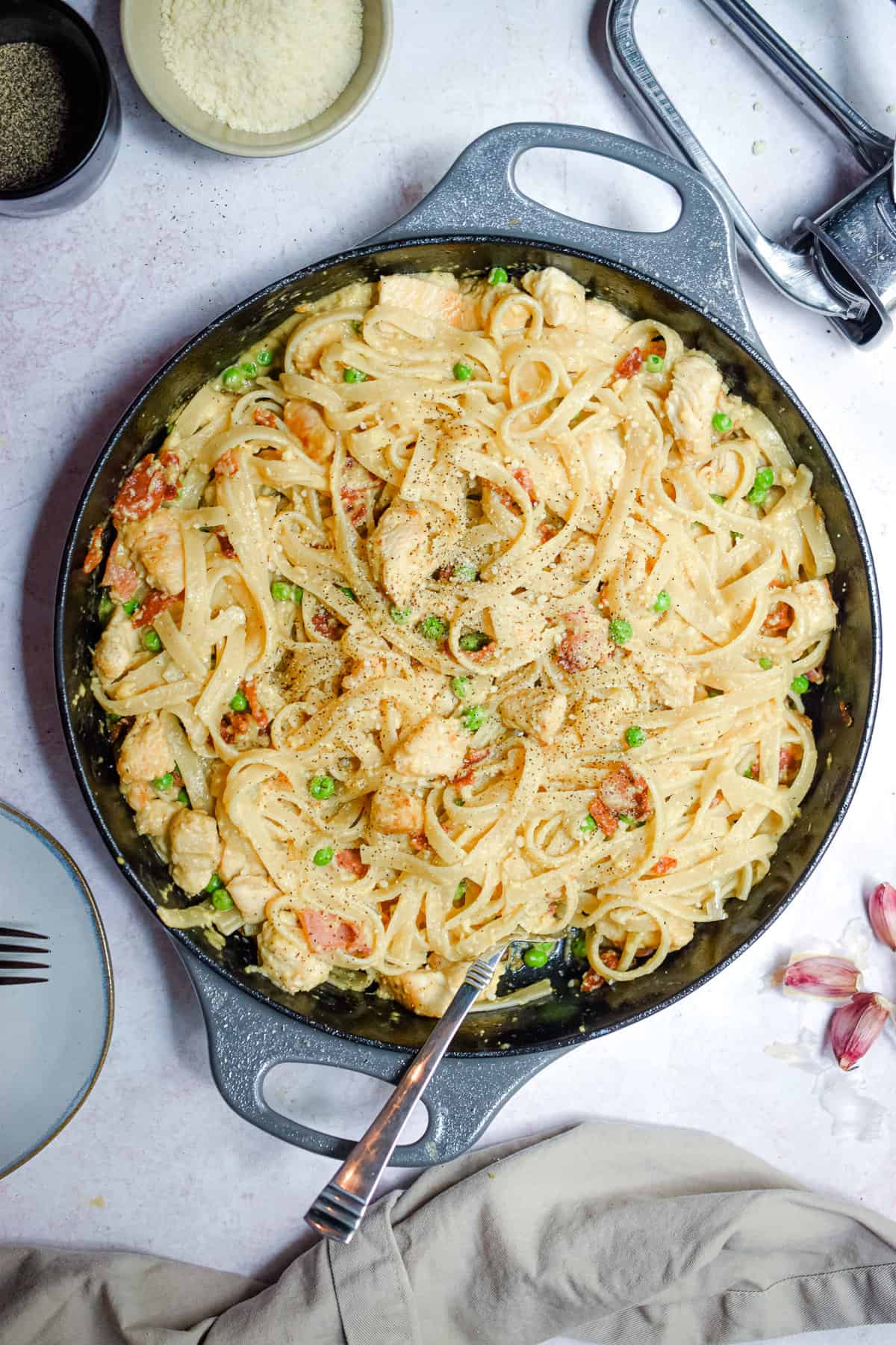 An overhead shot of a pot of chicken carbonara