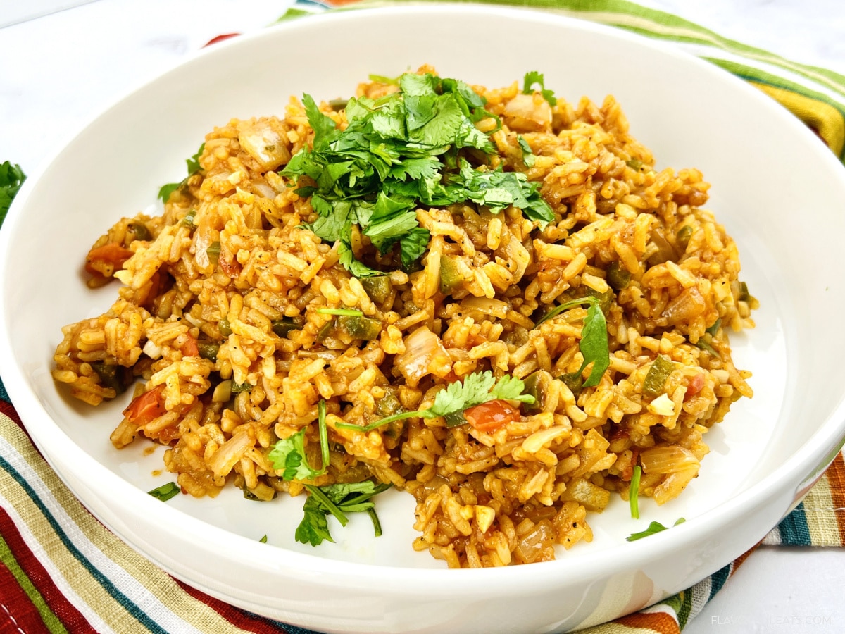 A white plate with The Best Mexican Rice on it.