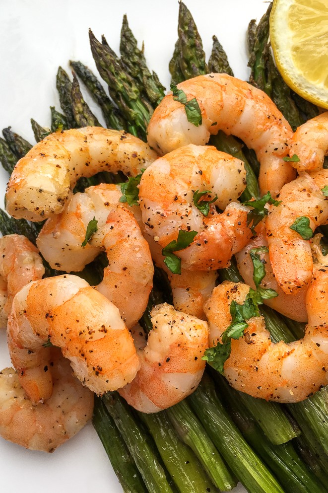 This Lemon-Garlic Shrimp & Asparagus is a one pan meal that is quick, easy, tasty and healthy! A great way to get some veggies in your diet.