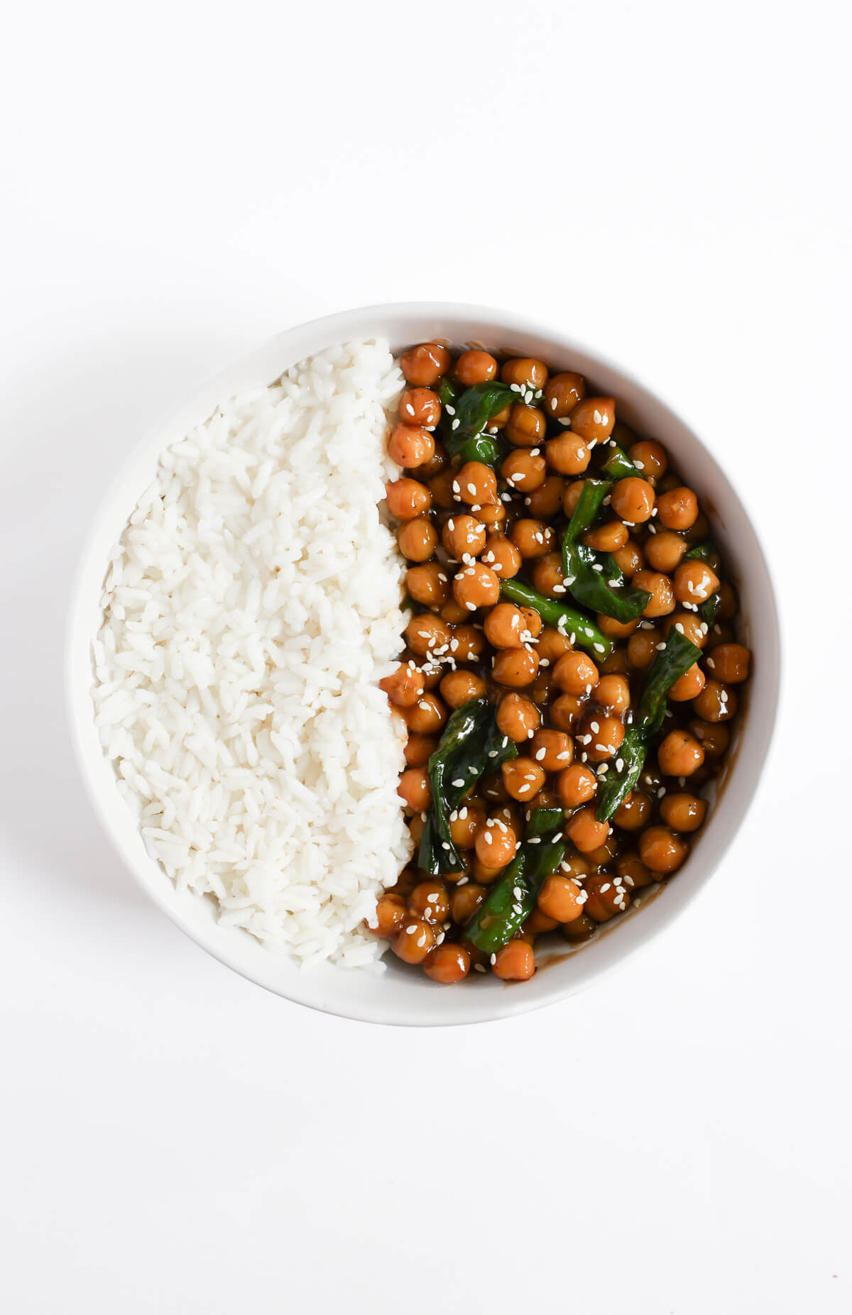 bowl of vegan mongolian chickpeas with white rice.