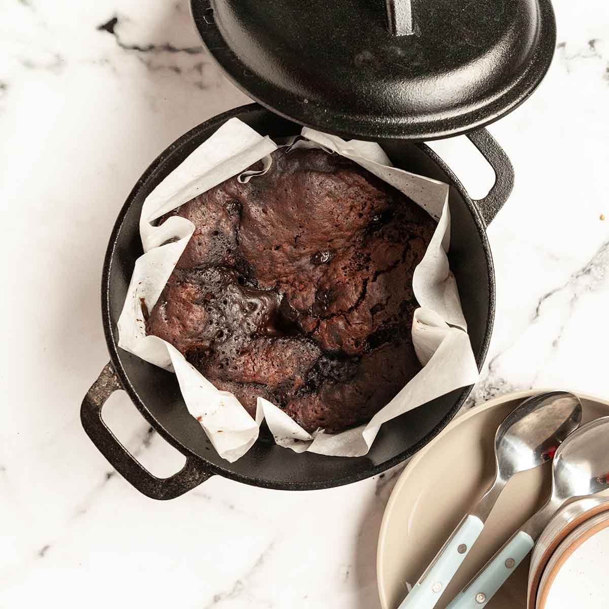 A chocolate cake in a Dutch oven.