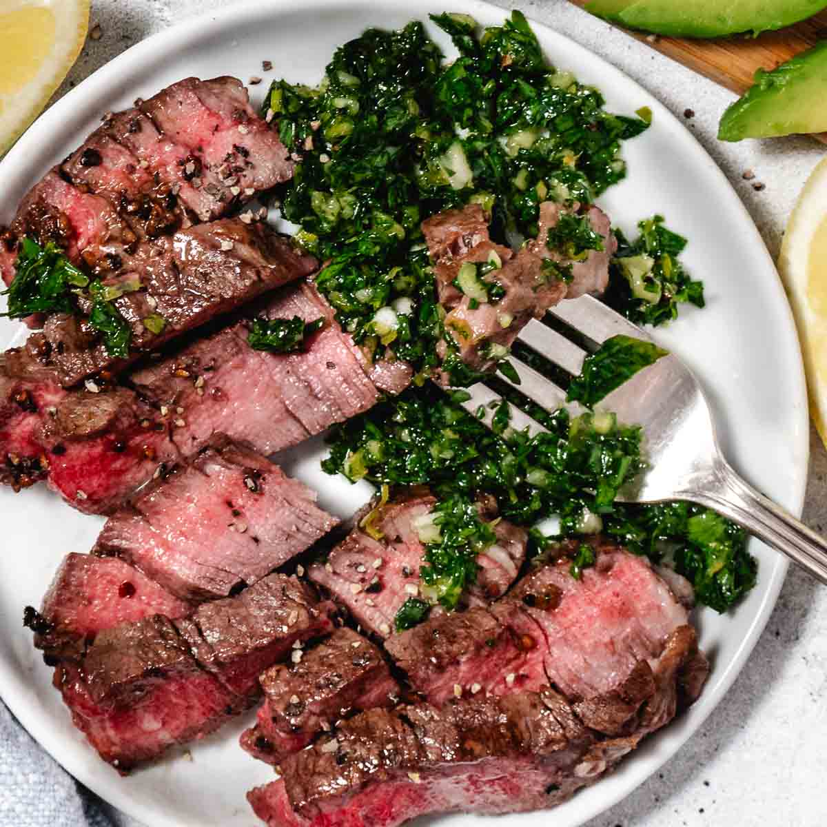 plate of steak smothered with gremolata