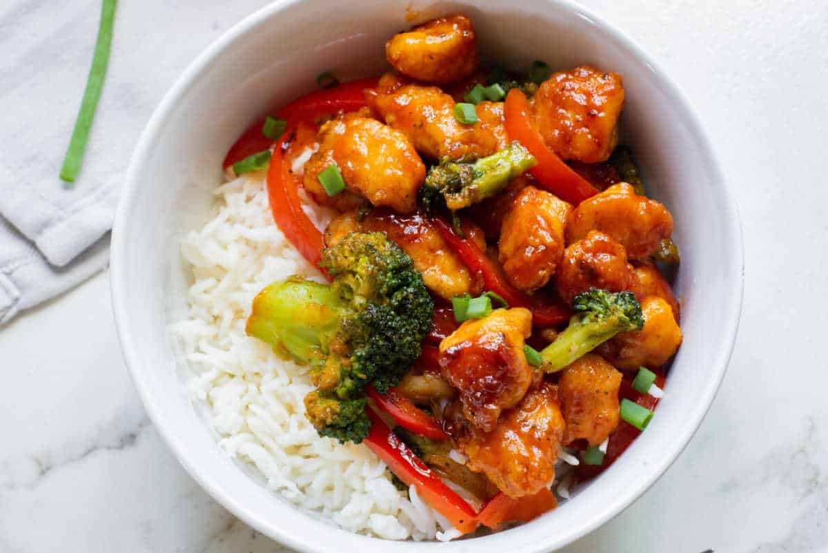 Honey buffalo chicken in a bowl with rice.